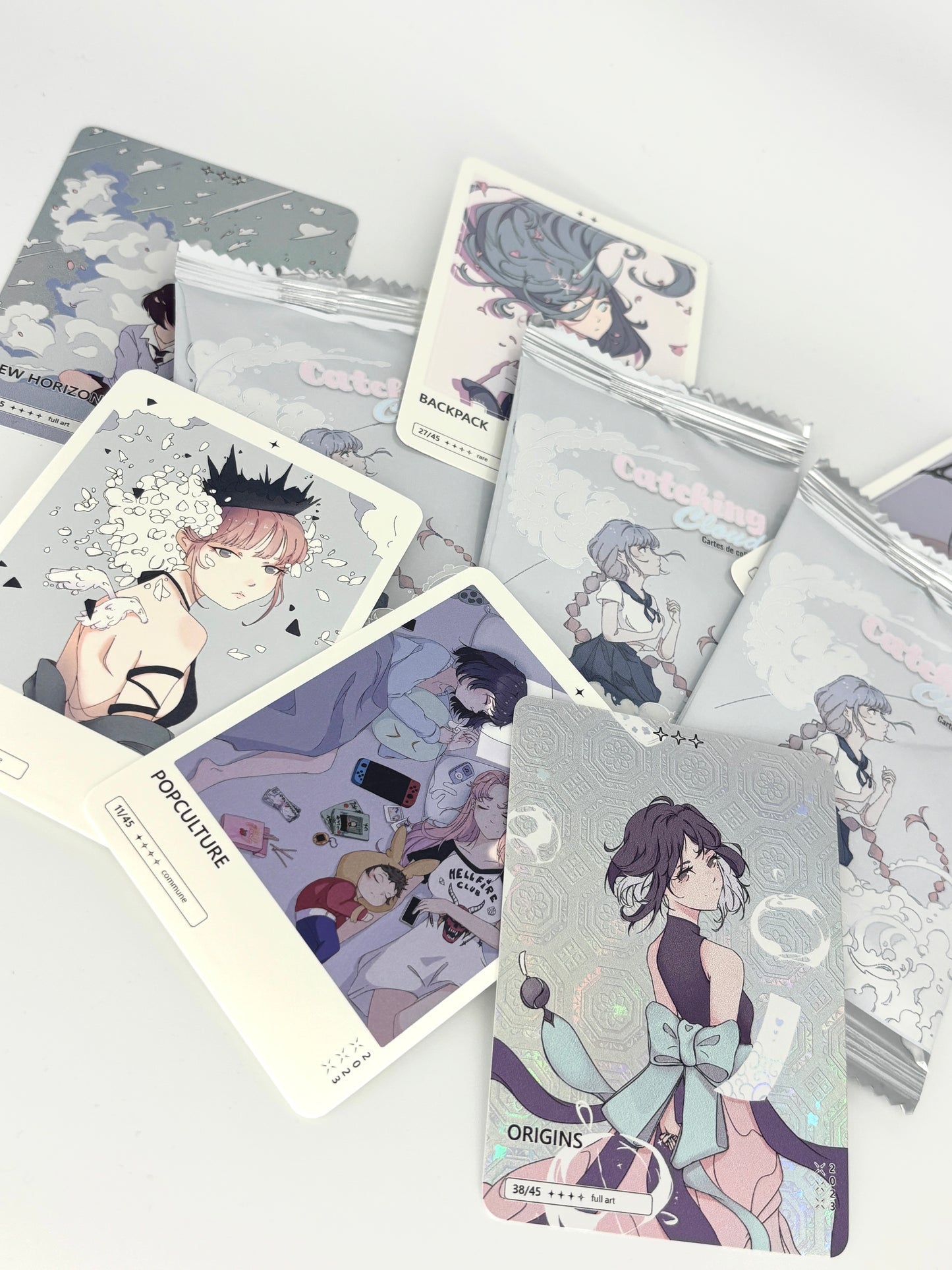 Display 12 boosters Série Catching Clouds