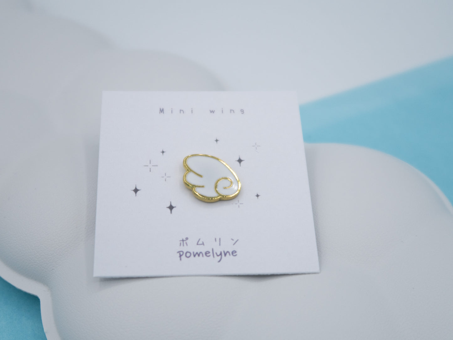 Mini pins Aile