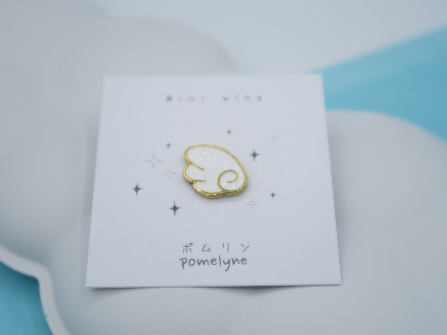 Mini pins Aile