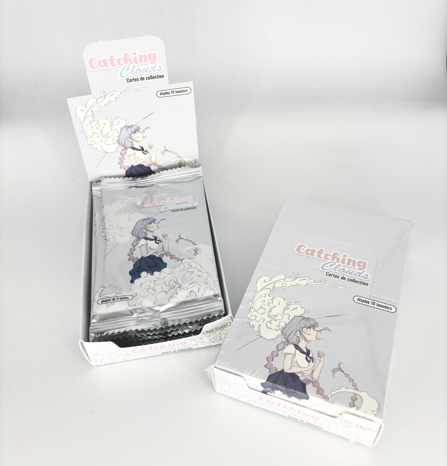 Display 12 boosters Série Catching Clouds
